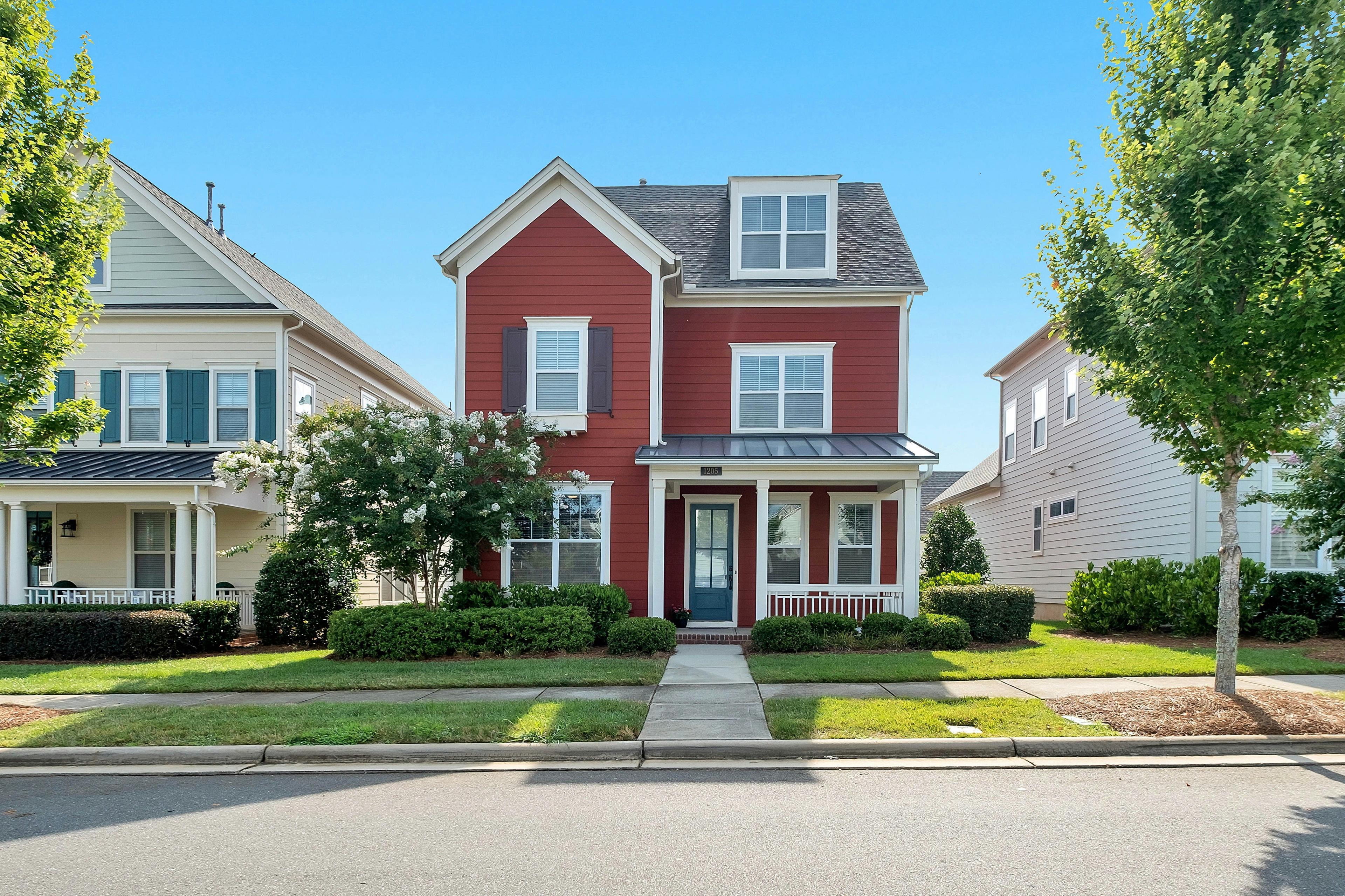 Red house with lawn.